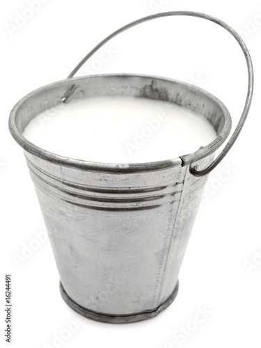 metal bucket with milk