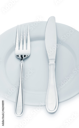 Knife and fork on a plate