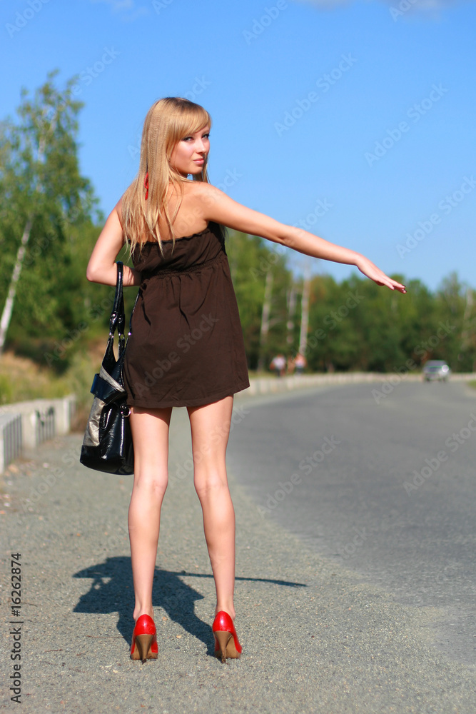 Young girl on road Young girl on road