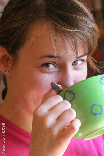 Girl's drinking  hot chocolate, from a mug photo