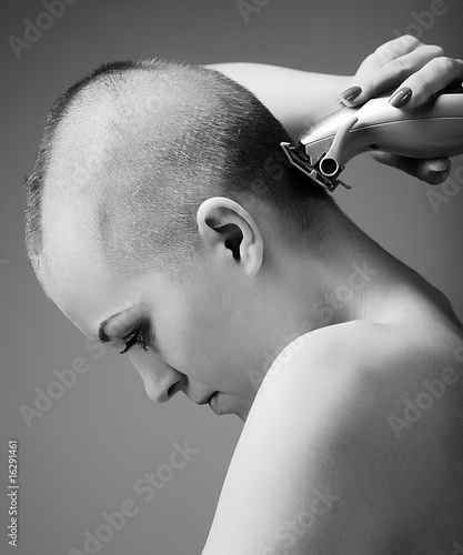 Girl shavinng her head photo