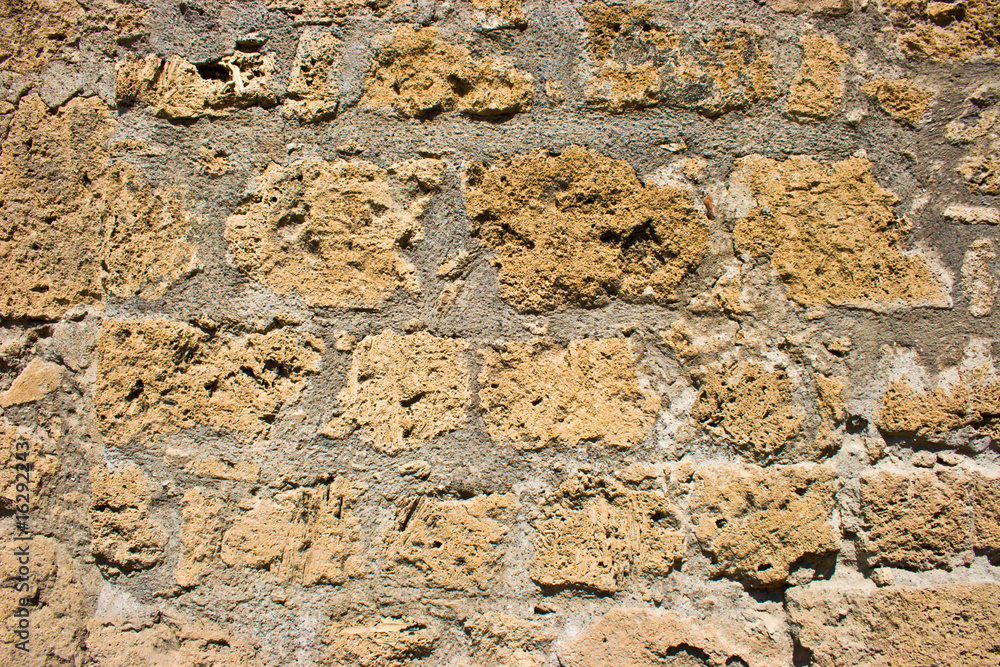 Fototapeta premium Yellow brick wall
