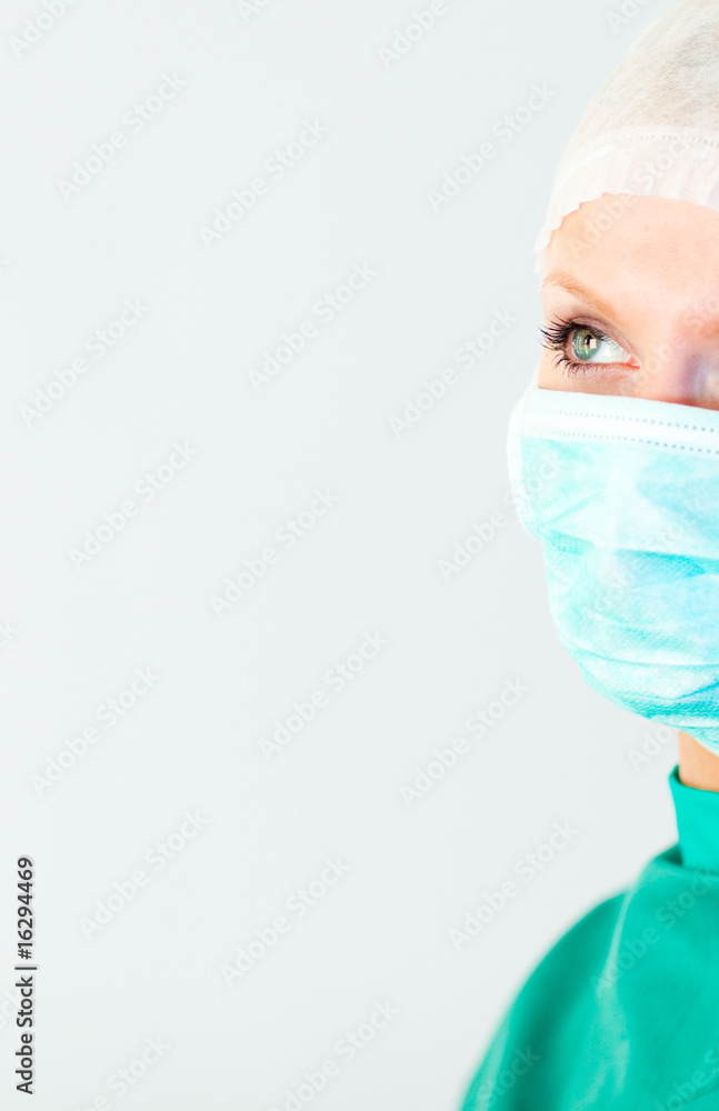 Close-up of a surgeon looking away the camera Close-up of a surgeon looking away the camera
