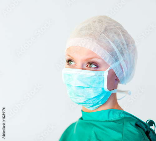 surgeon looking away from camera