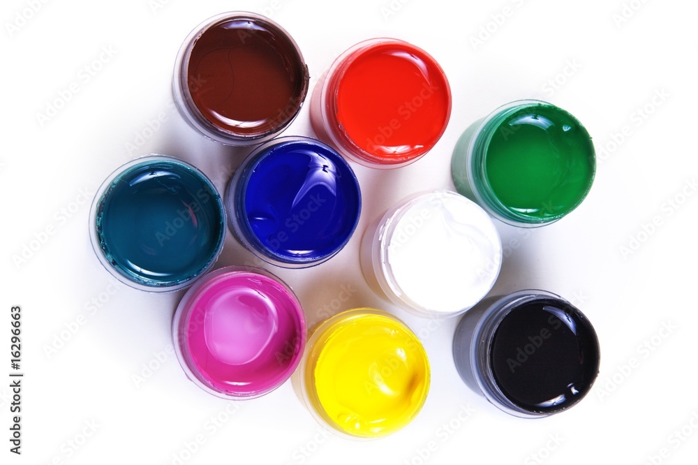 opened containers with paint of different colours opened containers with paint of different colours