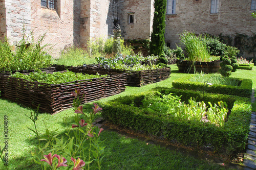 Medieval herb- and flower garden photo