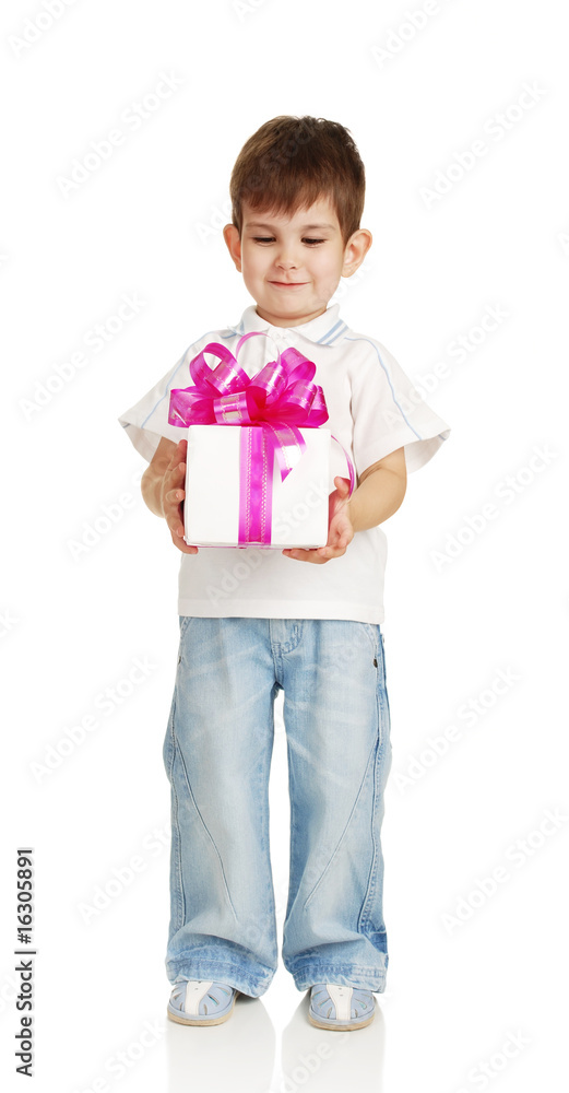 The little boy with a gift in a hands The little boy with a gift in a hands