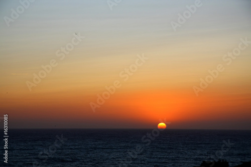 Sunset on the ocean © Vaclav Janousek