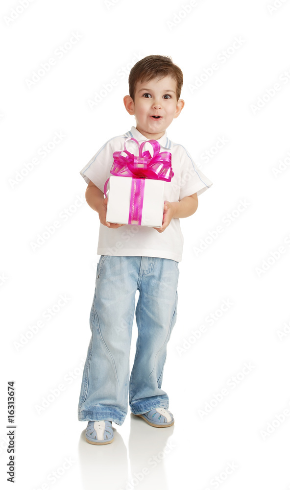 The little boy with a gift in a hands The little boy with a gift in a hands
