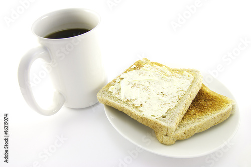 Toast on a White Plate with Coffee