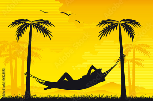 Woman relaxing in a hammock on tropical background