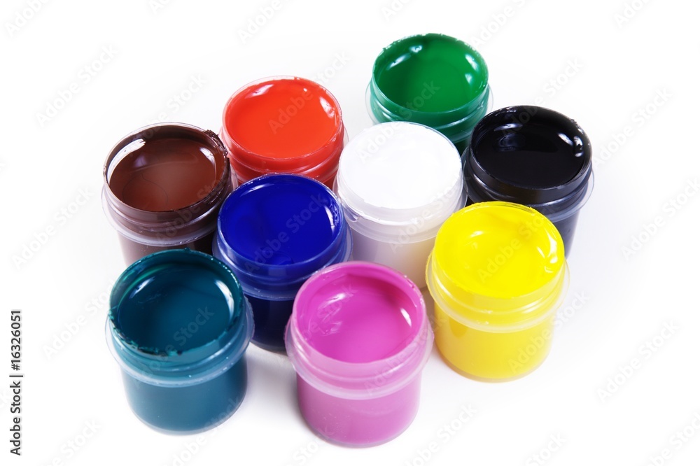 opened containers with paint of different colours opened containers with paint of different colours