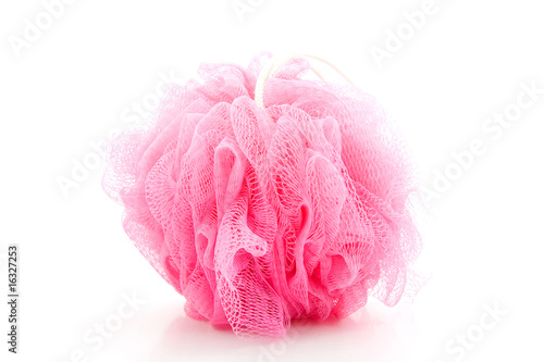 Pink sponge for showering over white background