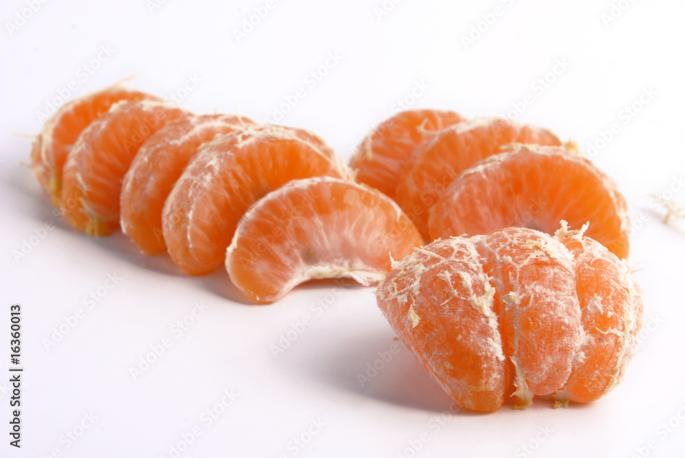 Tangerine slices. Selective focus on the front Tangerine slices. Selective focus on the front