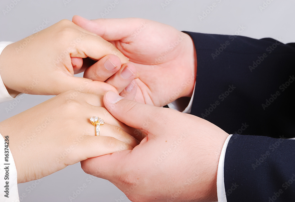 Young male holding woman hands closeup