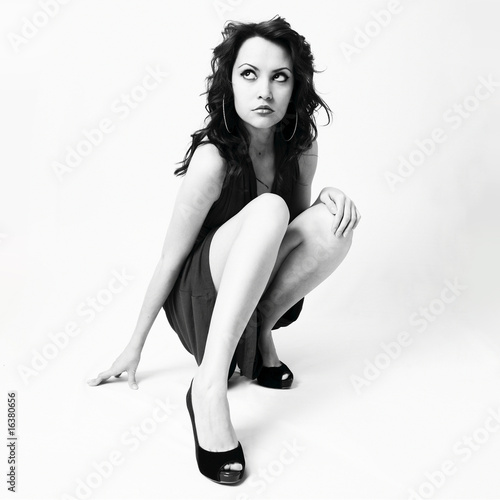 Beautiful young woman in elegant shoes