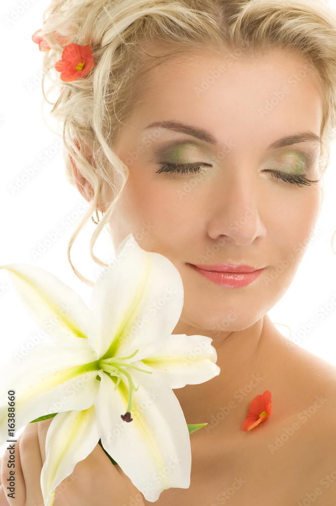 Beautiful young woman with lily flower. Close-up portrait .... Beautiful young woman with lily flower. Close-up portrait ....