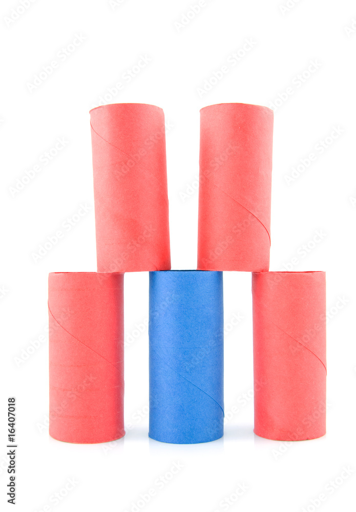 tower of empty toilet paper rolls over white background
