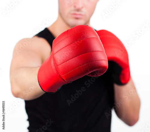 young man wearing boxing gloves © WavebreakMediaMicro