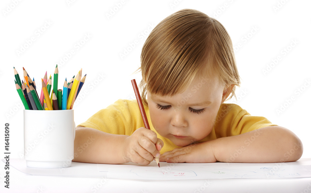 Child draw with crayons