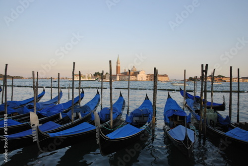 Venice Gondolas lined up by pier © Tourmalet06