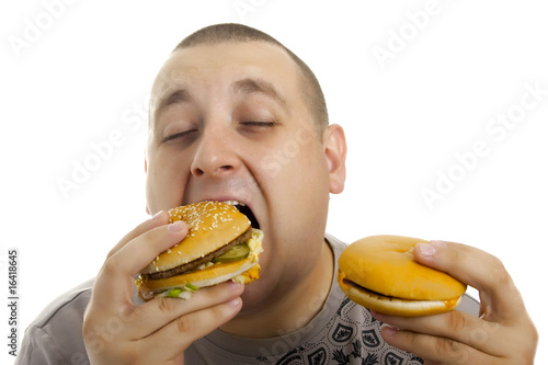 Hungry man with hamburger.