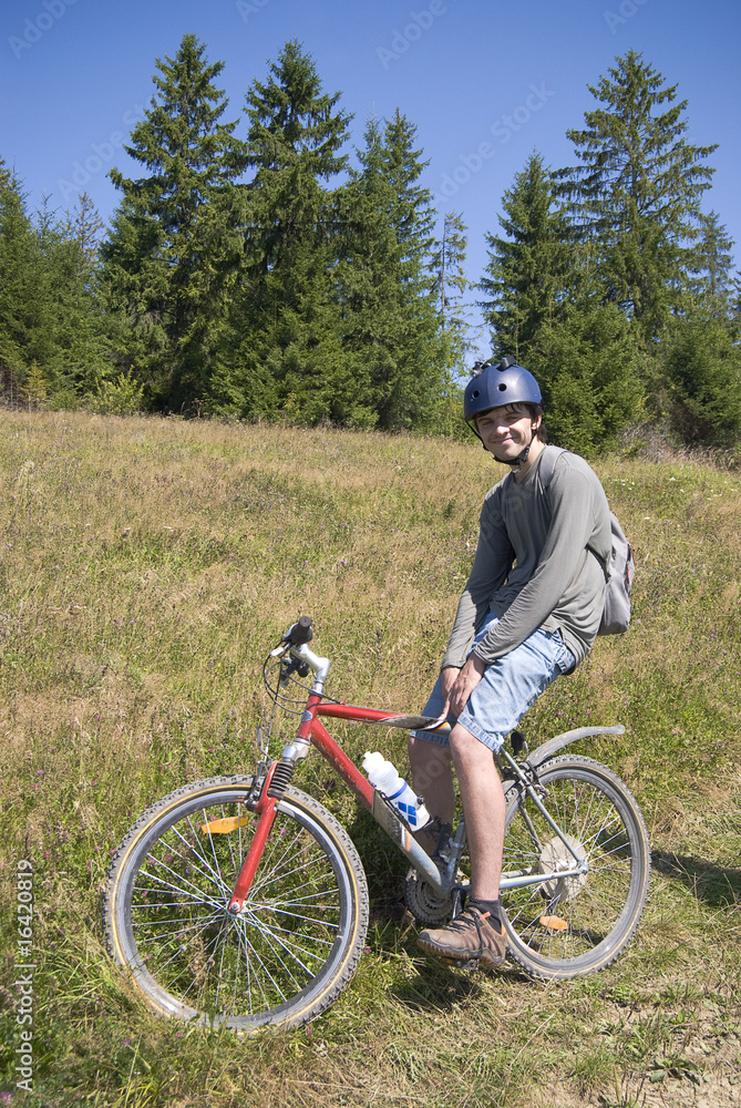 Fototapeta premium Young bicycle traveler