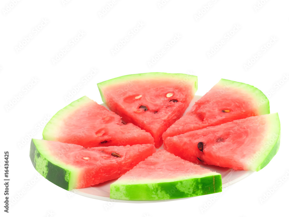 Slice of watermelon on white plate, isolated on white. Slice of watermelon on white plate, isolated on white.