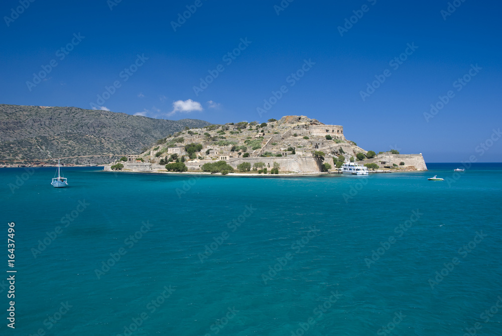 blue sea in Greece with the island spina longa