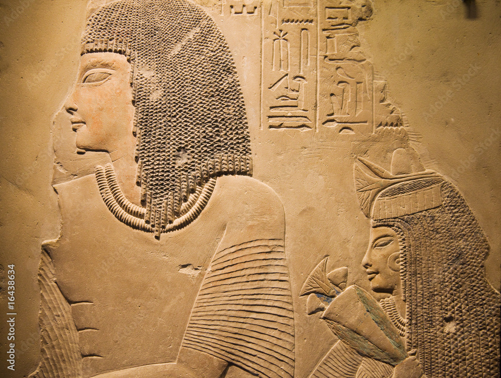 Male and female on an ancient Egyptian relief Stock Photo | Adobe Stock