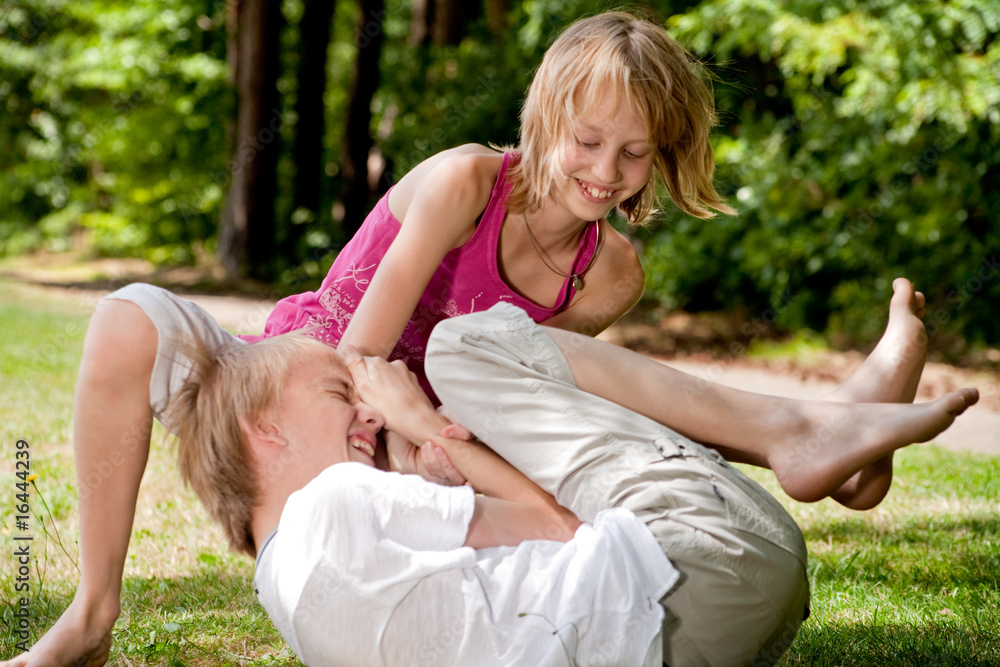 Fototapeta premium Frolic brother and sister