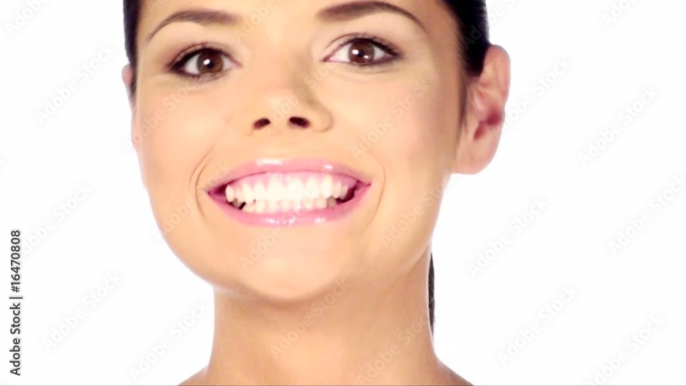 Smiling and beautiful woman looking around, she is isolated Smiling and beautiful woman looking around, she is isolated