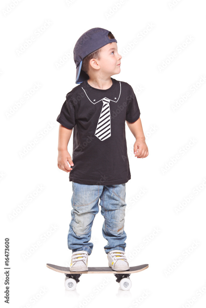 Little child on a skateboard isolated on white background Little child on a skateboard isolated on white background