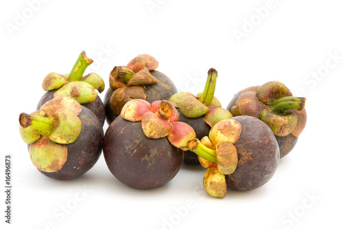 Mangosteens over white background