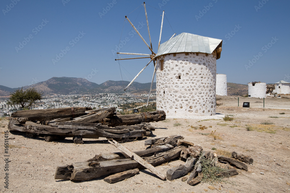 Fototapeta premium Medieval windmill overlooking Gumbet and Bodrum