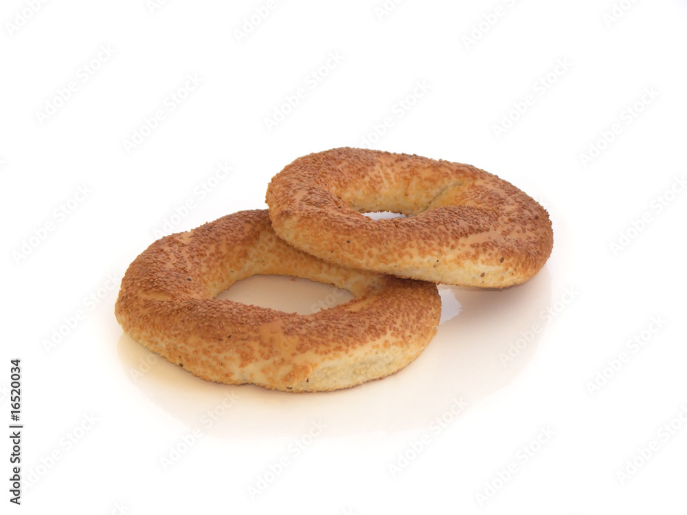 Two bagels with sesame isolated on white Two bagels with sesame isolated on white
