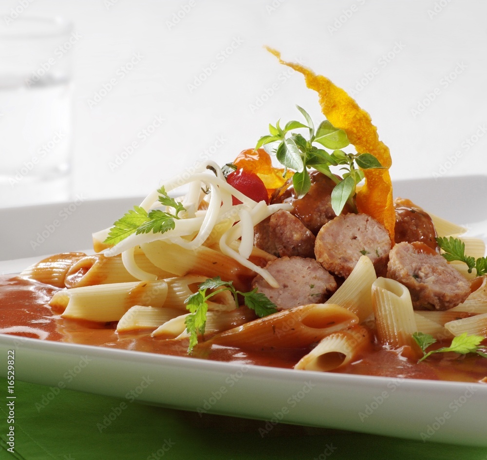 Pasta and meatballs in tomato sauce