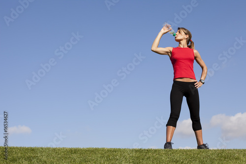 woman refreshing after the exercise