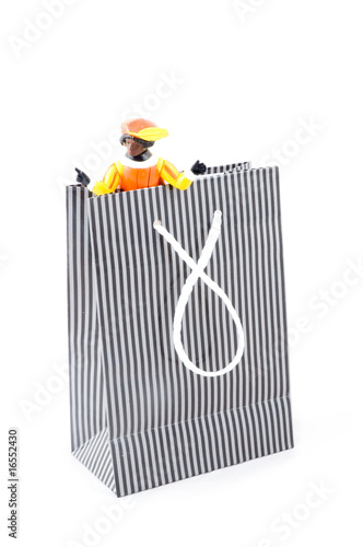 zwarte pieten in a shopping bag, characters from a traditional d photo