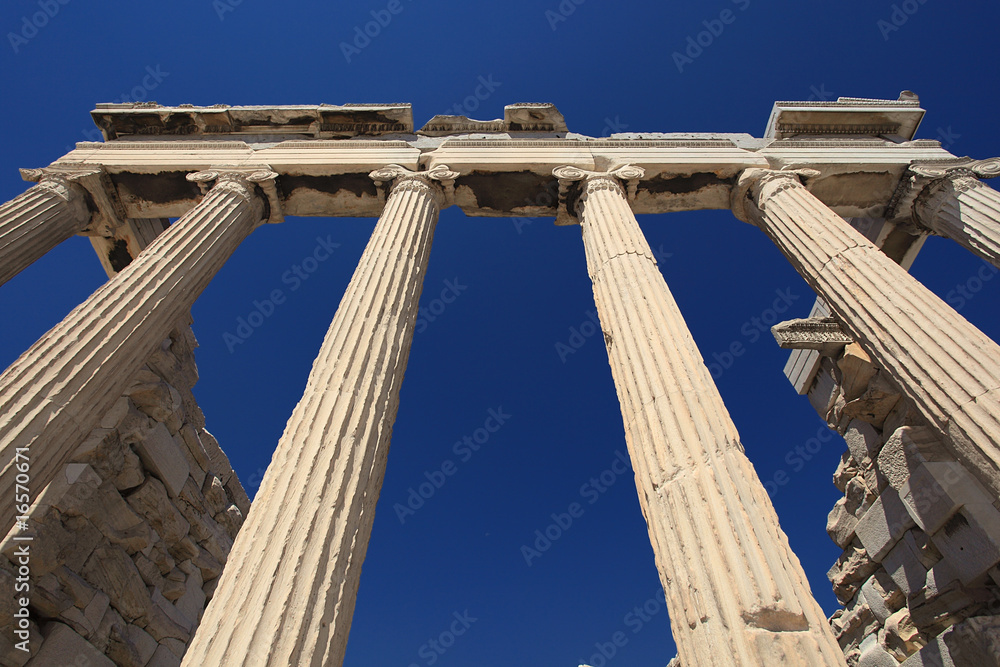 Ancient columns with blue sky in Greece