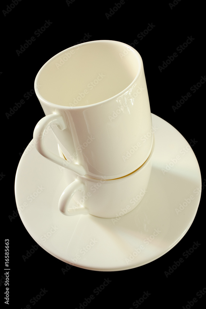 Two cups for espresso coffe, isolated on black Two cups for espresso coffe, isolated on black