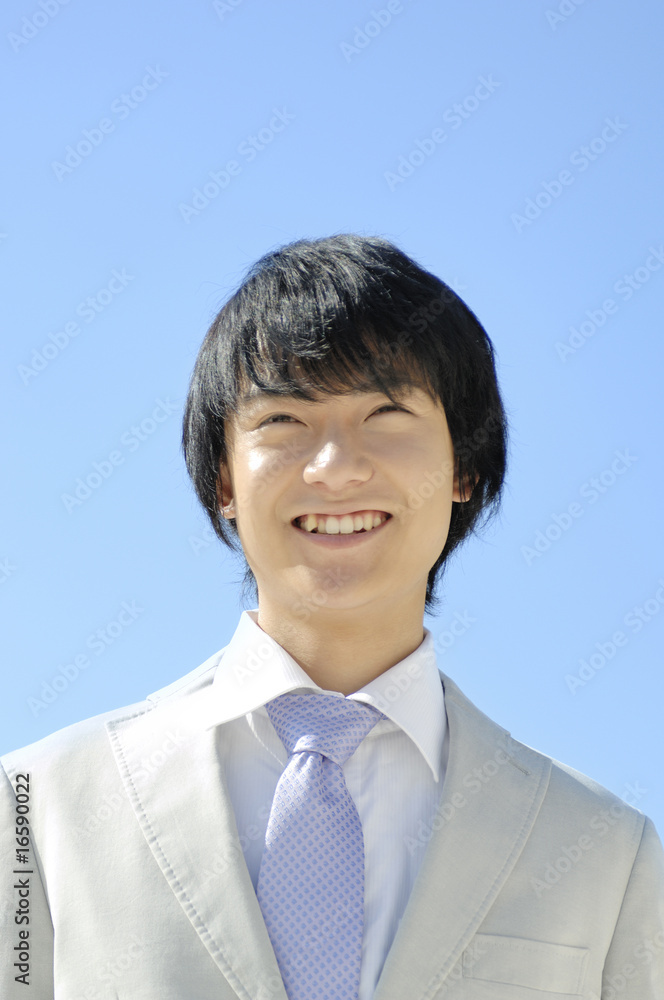 笑っているビジネスマン 笑っているビジネスマン