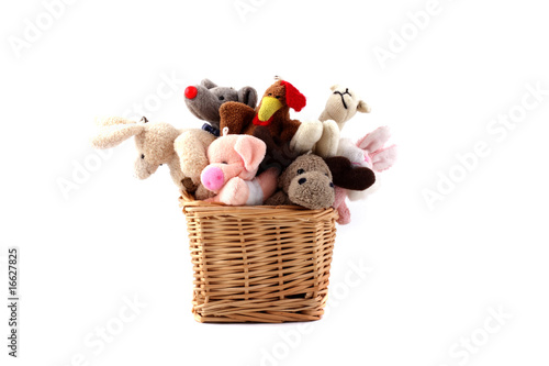 Soft toys in a wattled basket