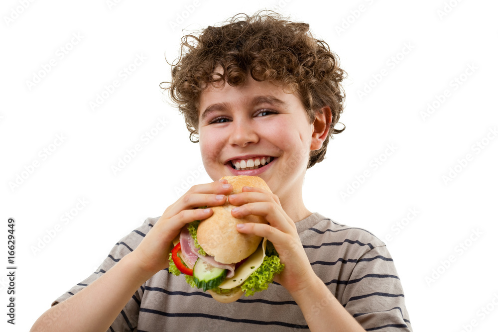 Kid eating healthy sandwich isolated on white Kid eating healthy sandwich isolated on white
