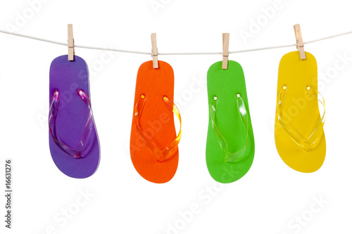 Fotografi Colorful flip-flop sandles on a Clothesline