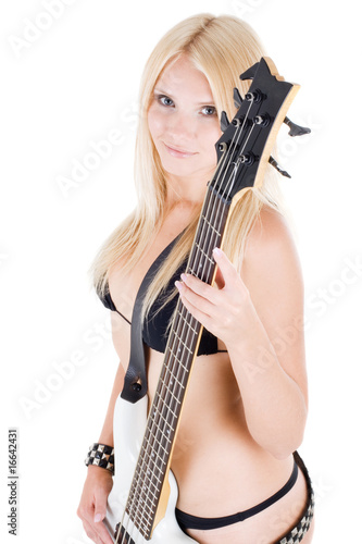 Sexual blonde and a white bass guitar