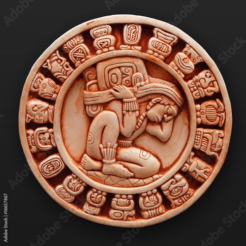 Stone bas-relief human round latin america