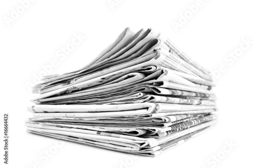 Stack of isolated newspapers in black and white