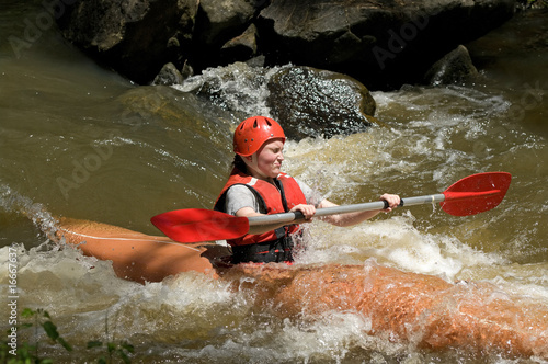 Fototapeta Naklejka Na Ścianę i Meble -  girl white water kayaking