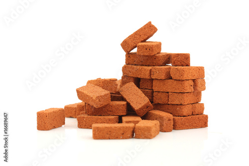 Big pile of bricks isolated photo